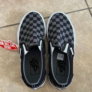 Black/Pewter checkerboard vans.